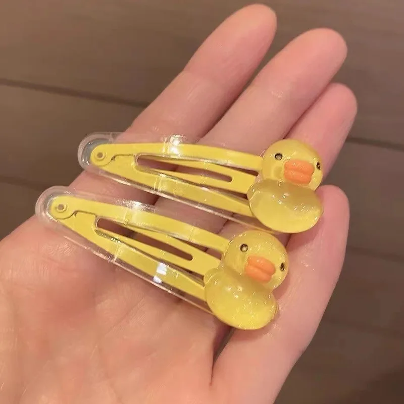 

2 шт. милые заколки для волос в виде мультяшных уточек, заколки-тюльпаны для девочек, прозрачные желтые заколки-уточки для челки, аксессуары