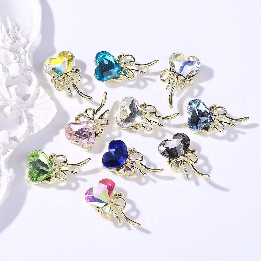 10 Uds. De diamantes de imitación de aleación para decoración de uñas, diseño 3D translúcido, dijes para decoración de uñas, corazón torcido de lujo, decoraciones para uñas DIY