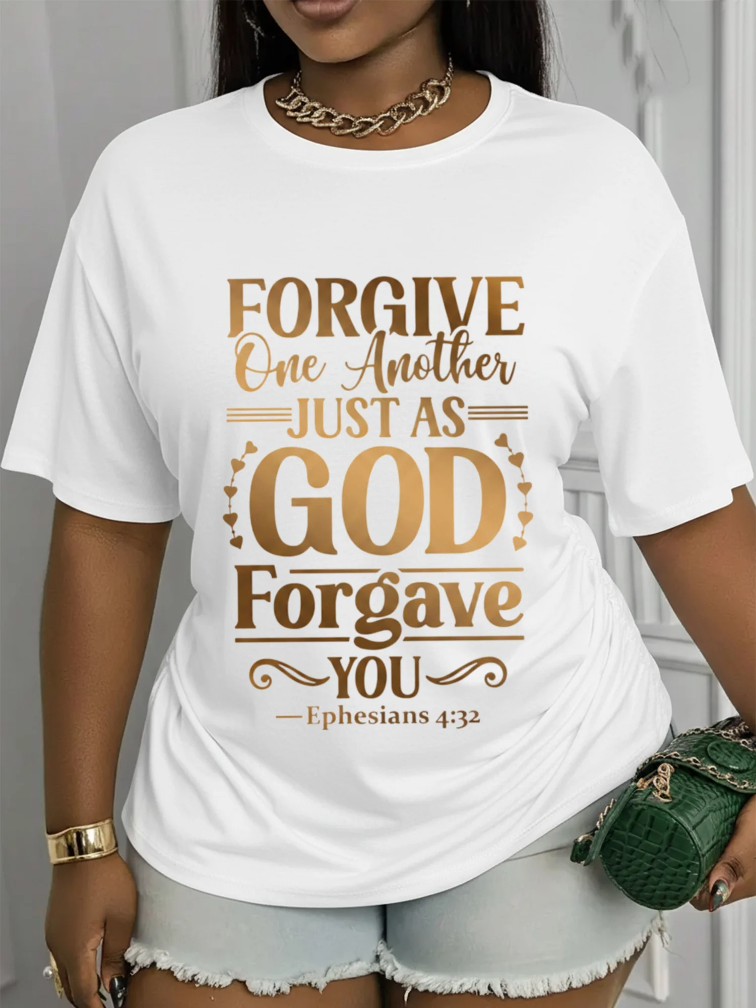Short-Sleeve, Crew-Neck Printed T-Shirt Featuring The Design: 'Forgive One Another, Just As The Lord God Has Forgiven Us' (Ephesians 4:32). This Stylish Top Features a Casual Crew Neck And Is Crafted from Soft, Stretchy Fabric. Machine Washable And