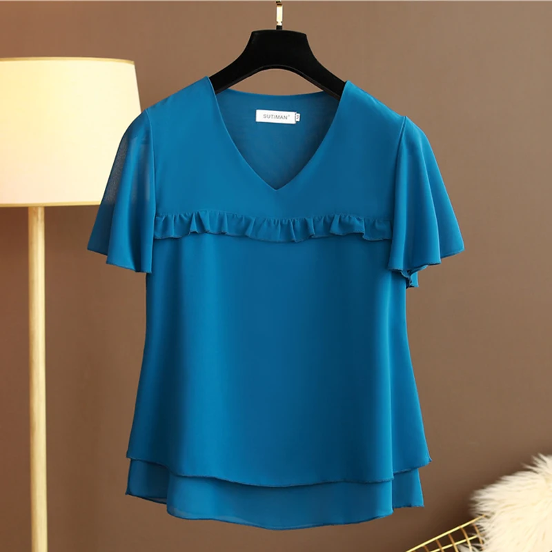 

Летняя женская футболка 2024 года с V-образным вырезом, свободного кроя, с оборками и узором «снежинка», скрывающая живот, однотонная, из полиэстера...