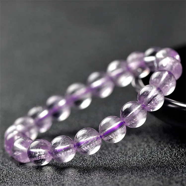 

Natural crystal collection Brazilian old material kunzite spodumene Bracelet female cat's eye stone Lavender goddess Bracelet