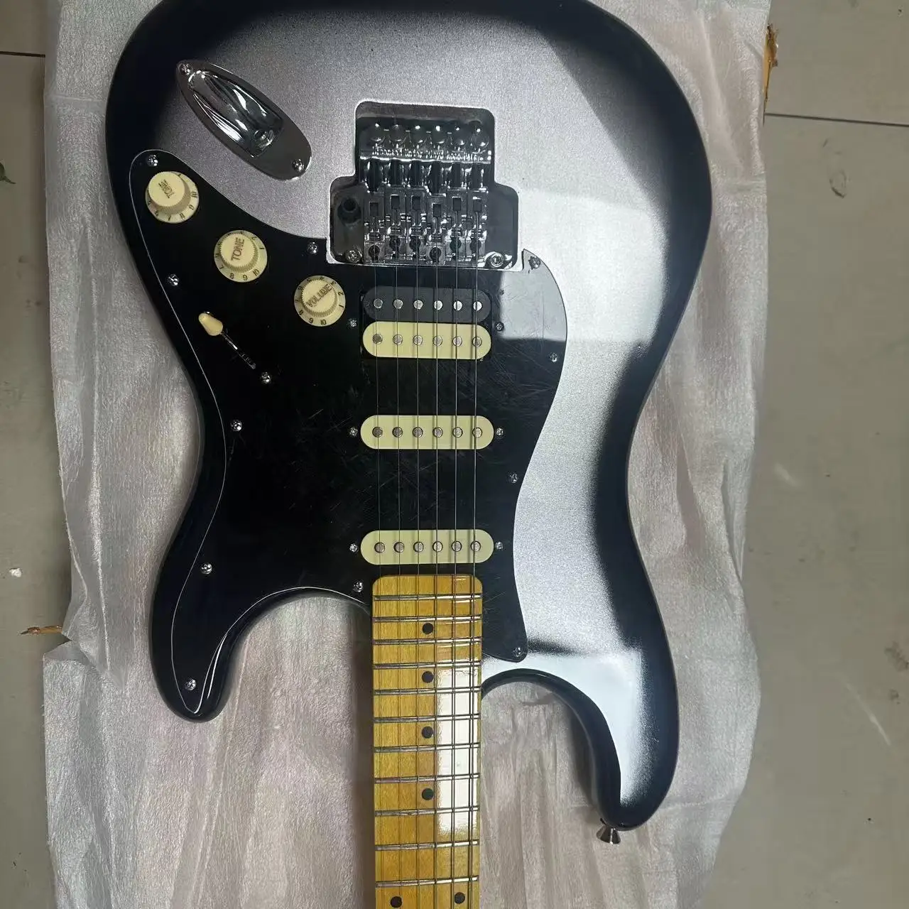 

2026 hot Guitar factory good quality Luxe Guitar with Floyd HSS and Maple Fingerboard Silverburst Guitar