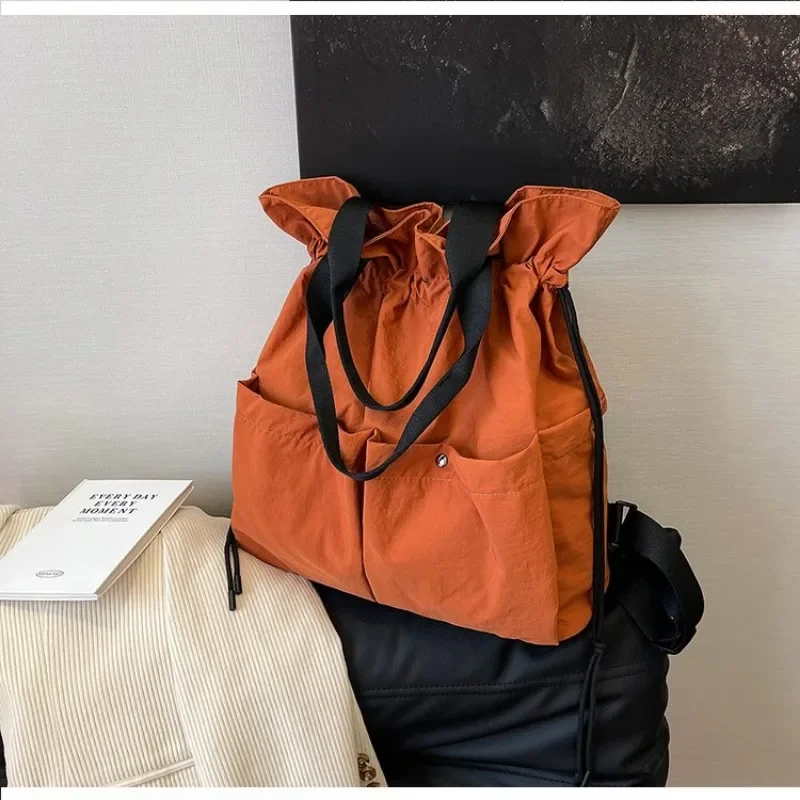 2025 New Casual Solid String Style Nylon Backpacks Fashion Large Capacity High Quality Designer Style Personality Shoulder Bags