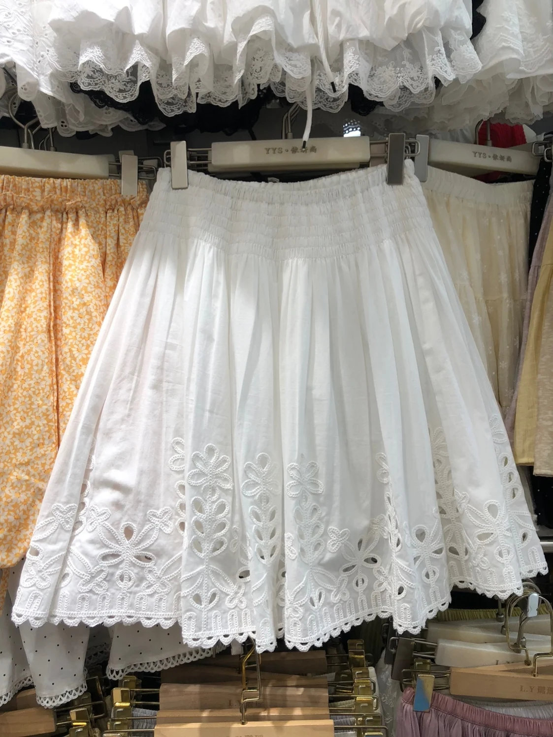 2026 Spring Summer Korean Style Beautiful White Hollow out A-Line  Skirt Unique Design High Waist Polyester Fiber Skirt