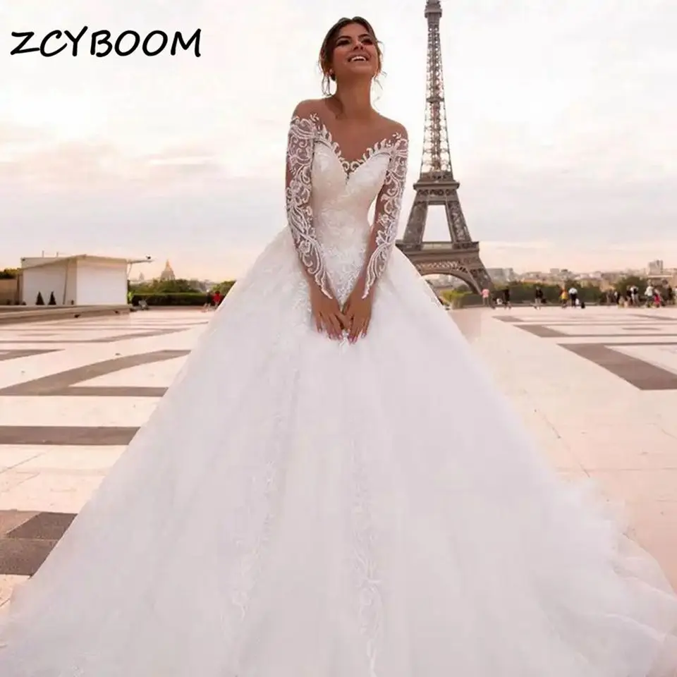 

Customized Charming Sweetheart A-Line Illusion Wedding Dress 2024 Lace Appliques Button Back Long Sleeve Court Train Bride Gowns