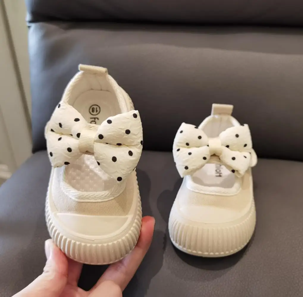 Zapatos de lona con lazo de lunares para bebés y niños pequeños, zapatillas planas de princesa de suela suave, diseño de boca cuadrada