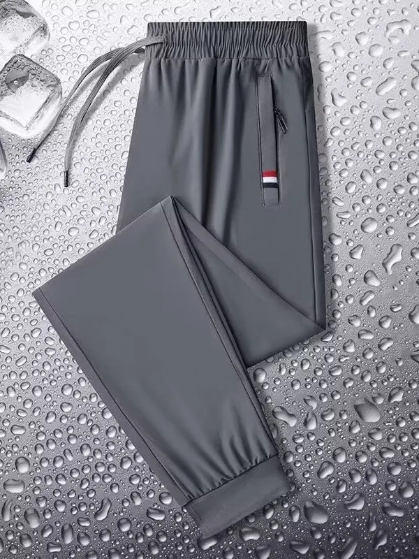 アイスシルクカフスパンツメンズ夏の新スタイルスポーツカジュアルルーズフィット通気性快適なストレートレッグパンツポリエステル繊維