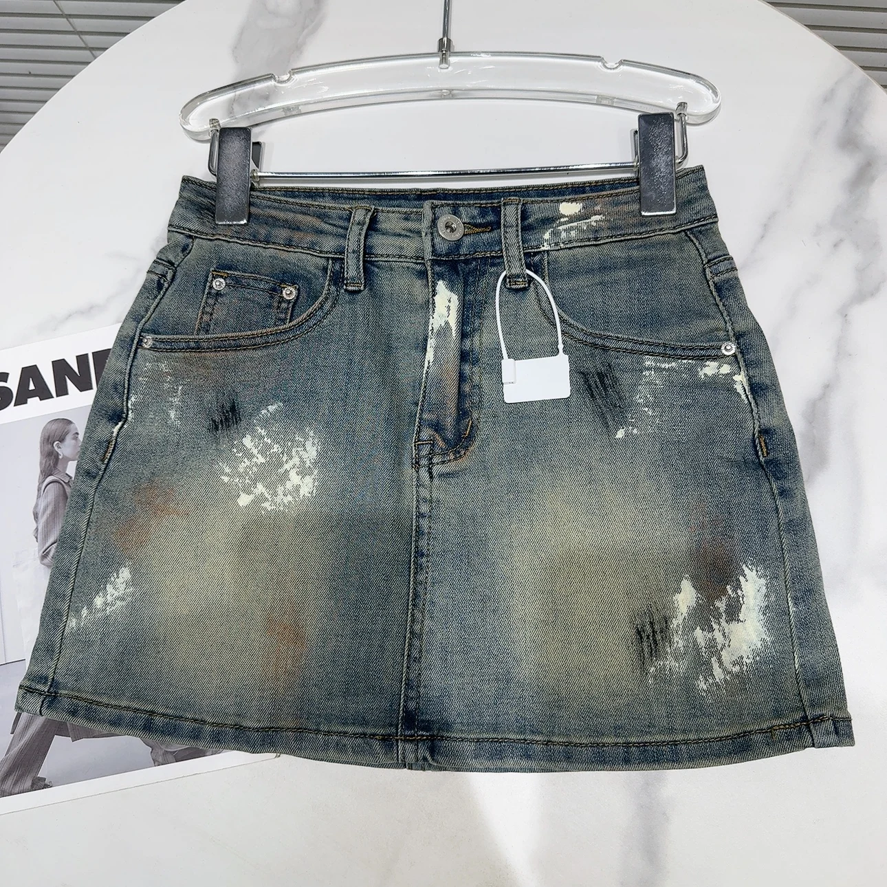 Spódnica dżinsowa Street Sle fiti Waed, modna, zakrywająca pośladki, o długości do kolan, dla młodych kobiet w wieku 20-tych lat.