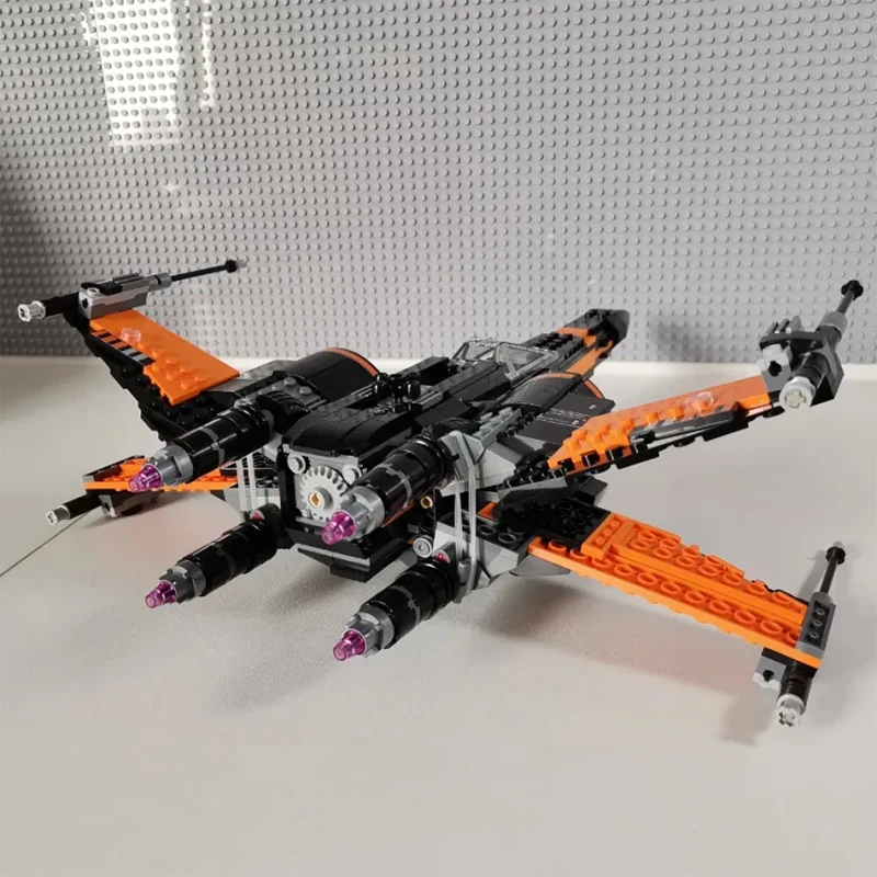 717 ชิ้น สินค้าใหม่ในสต็อก ชุดตัวต่อโมเดลยานอวกาศ X-wing Fighter ของโป สงครามอวกาศ ของเล่นตัวต่อประกอบเอง ของขวัญสำหรับเด็กผู้ชายและผู้ใหญ่