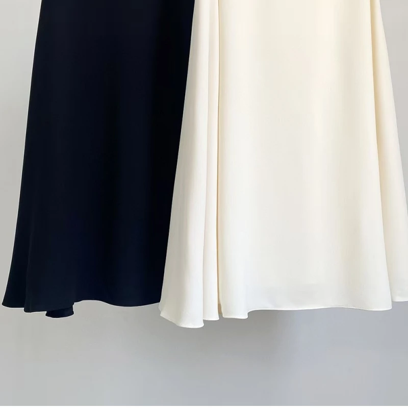 تنورة متوسطة الطول كلاسيكية على الطراز الأوروبي والأمريكي بعمر 25 عامًا بلون سادة معلقة بخصر عالٍ