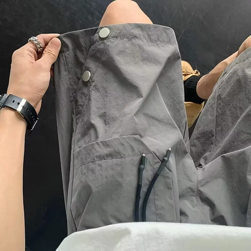 

Летние мужские шорты большого размера в стиле ретро, свободного кроя, быстросохнущие, для пляжа, повседневные, из полиэстера, прямые, длиной до колена