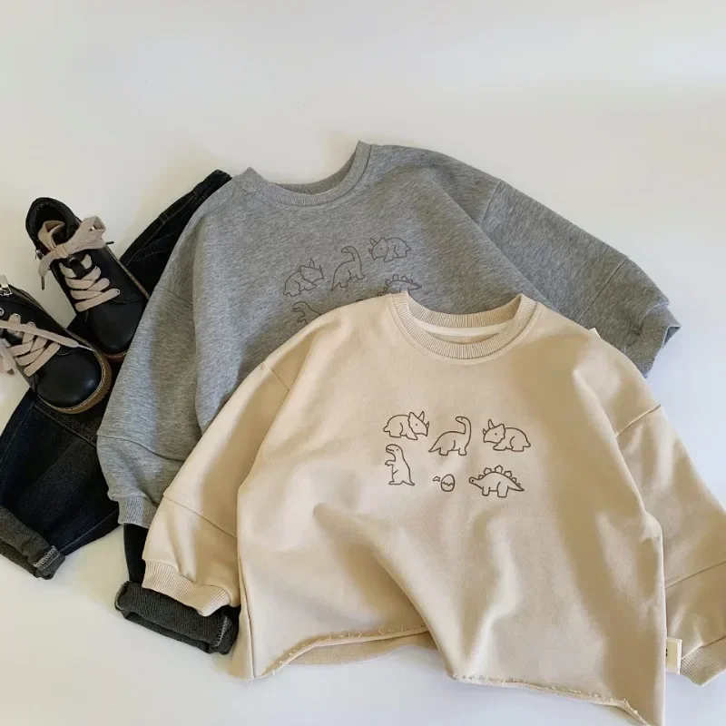 Felpe per bambini 2024 Autunno Inverno Dinosauro Pullover a maniche lunghe per bambini Top allentato per ragazzi Ragazze T-shirt T-shirt per bambini