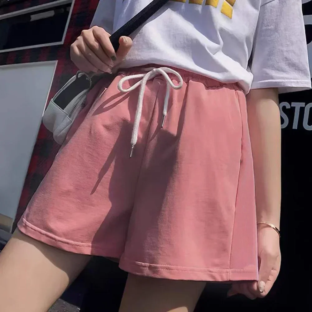 Calções de verão saias femininas elásticas cintura alta casual perna larga shorts coreano uma linha solta mini saia preto calças curtas