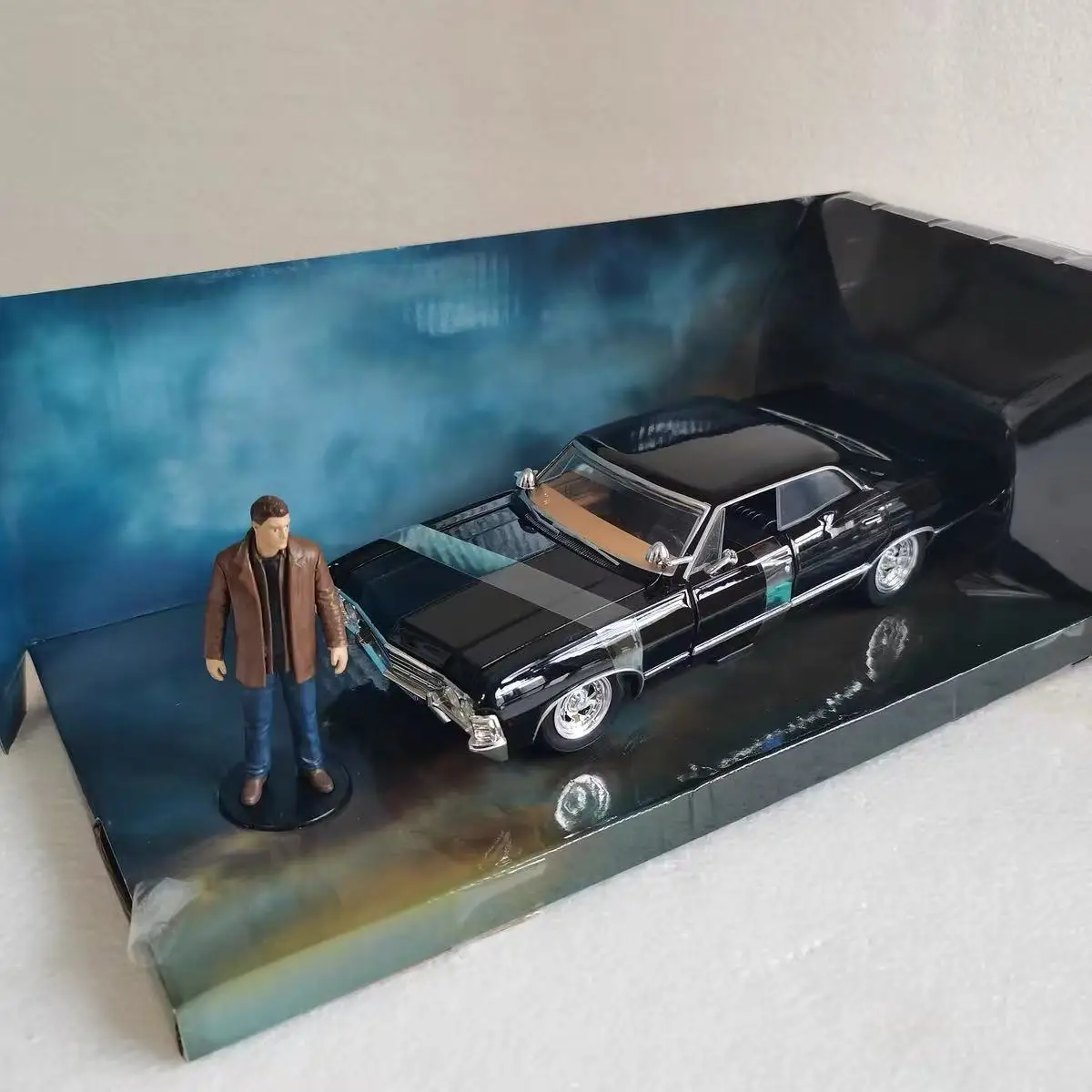 

In stock JADA Toys Supernatural 1967 Chevrolet Impala Sport Sedan 1:24 Scale Die-Cast Model