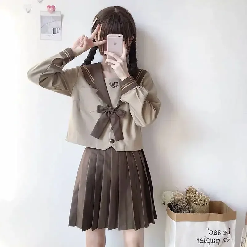 

Japanese Fashion School Uniform Soft JK Uniform Student Skirt Girl Milk Tea Brown Navy Wind Sailor Suit Pleated Skirt Set SH2025