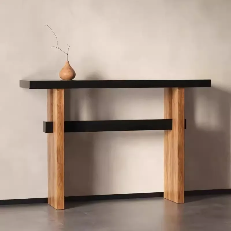 Medieval style solid wood entrance table against the wall when entering