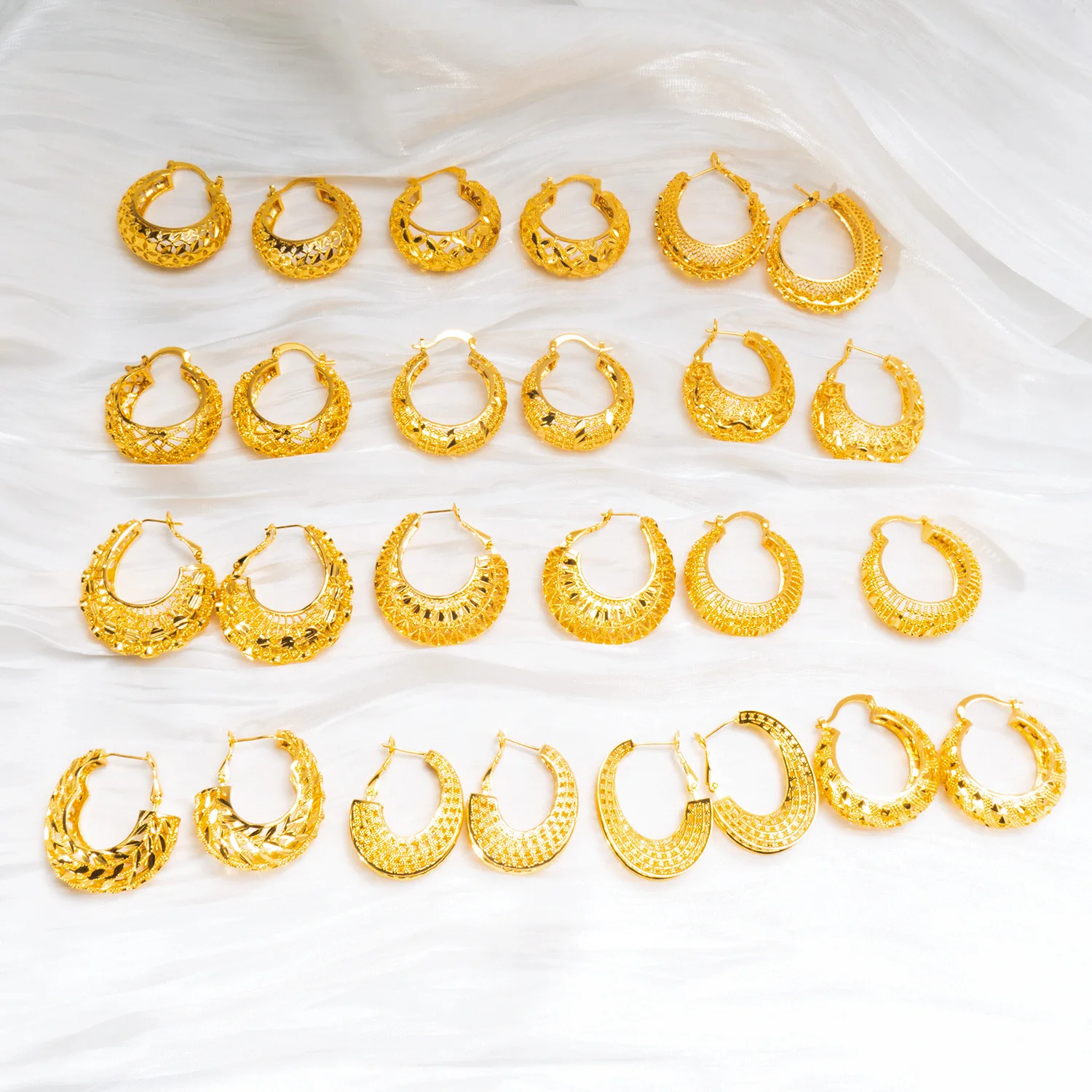 9999 gold high-end luxury niche earrings with heavy craftsmanship, featuring retro style and European design