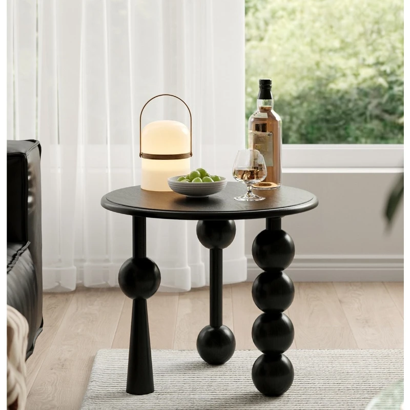 

A few simple small round tables for household use next to the medieval solid wood sofa on the lower left