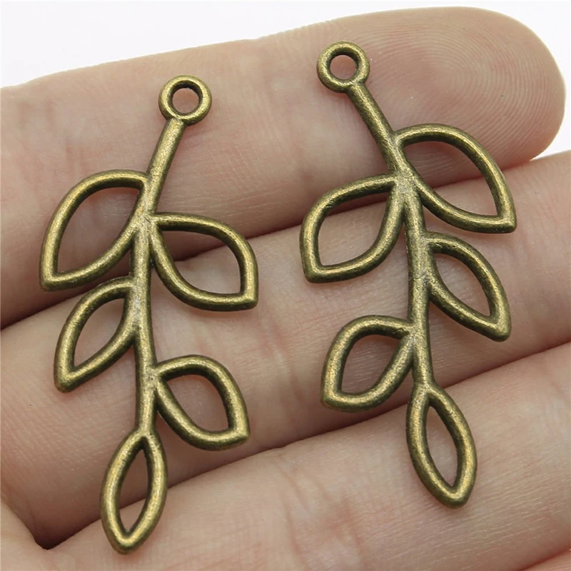 

50pcs/lot Mixed Antique Alloy Metal Hollow Out Leaves Loose Beads For Charm Making DIY Bracelets Necklace Accessories