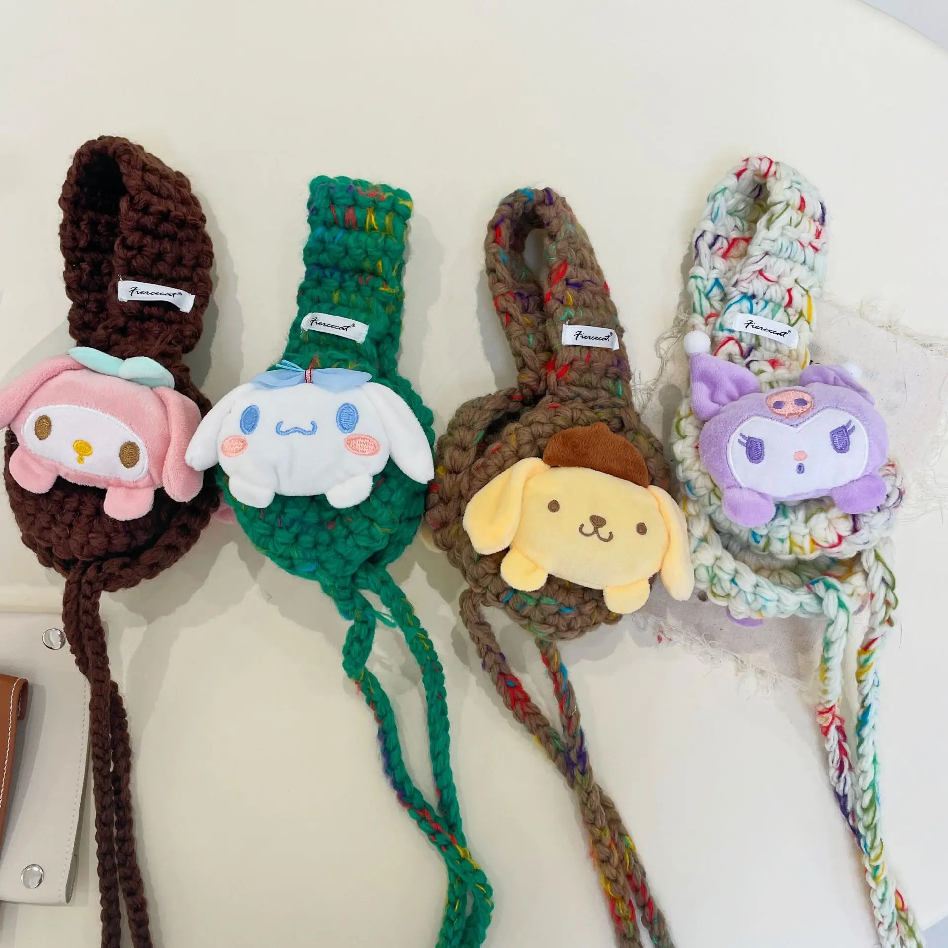 MINISO Sanrio 겨울 따뜻한 만화 양모 공 테더 학생 귀 보호 사이클링 니트 귀마개 따뜻한 양모 귀마개