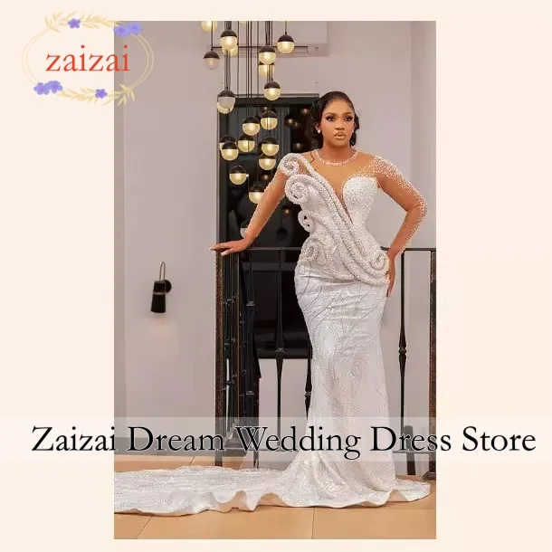 Customized Sheer Neck Shinny Beads Pearls Bridal Gowns Sweep Train Long Sleeves Wedding Dresses amanda novias official