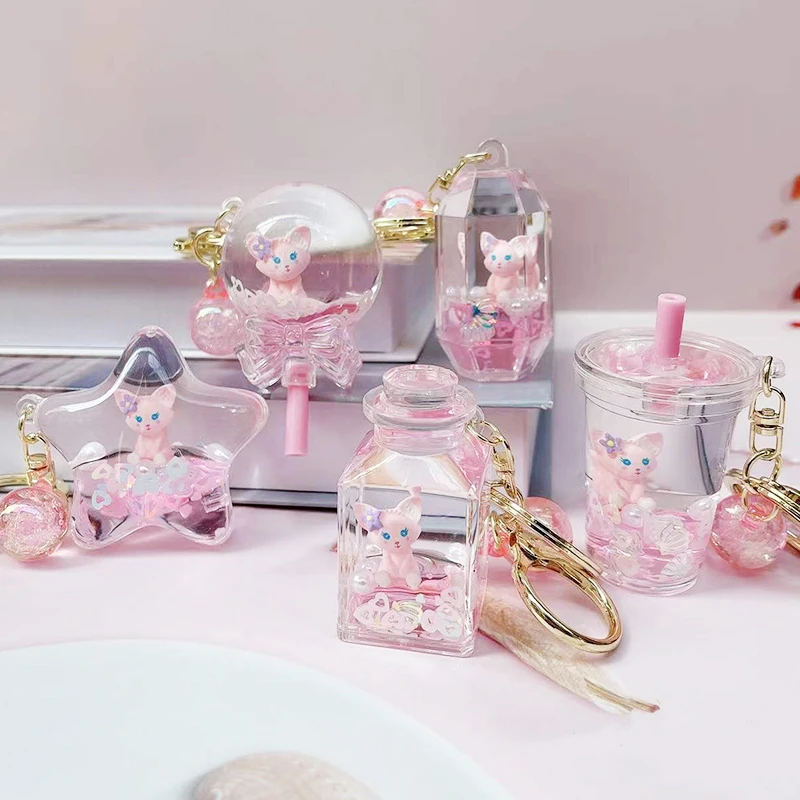 سلسلة مفاتيح كرتونية إبداعية ولطيفة لشخصية لينا بيل، تطفو في سائل زيت ورمل، زينة معلقة، هدية عيد ميلاد، مصنوعة من مادة الأكري...