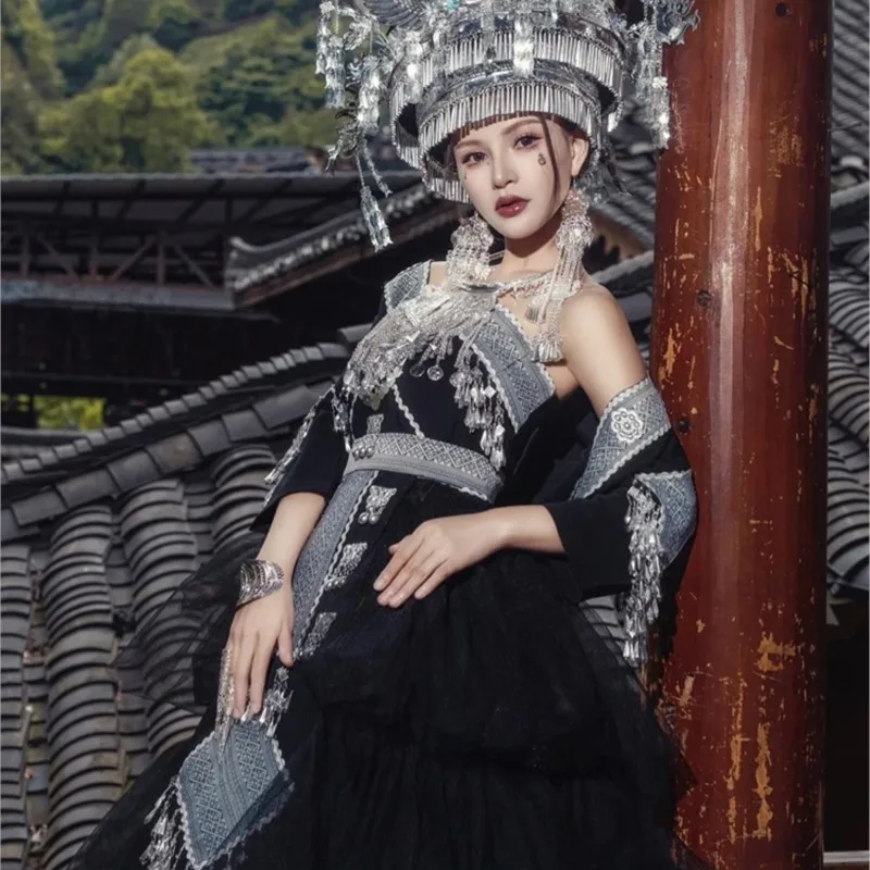 

Ethnic dress female wind tail long wedding photo Miao village clothing