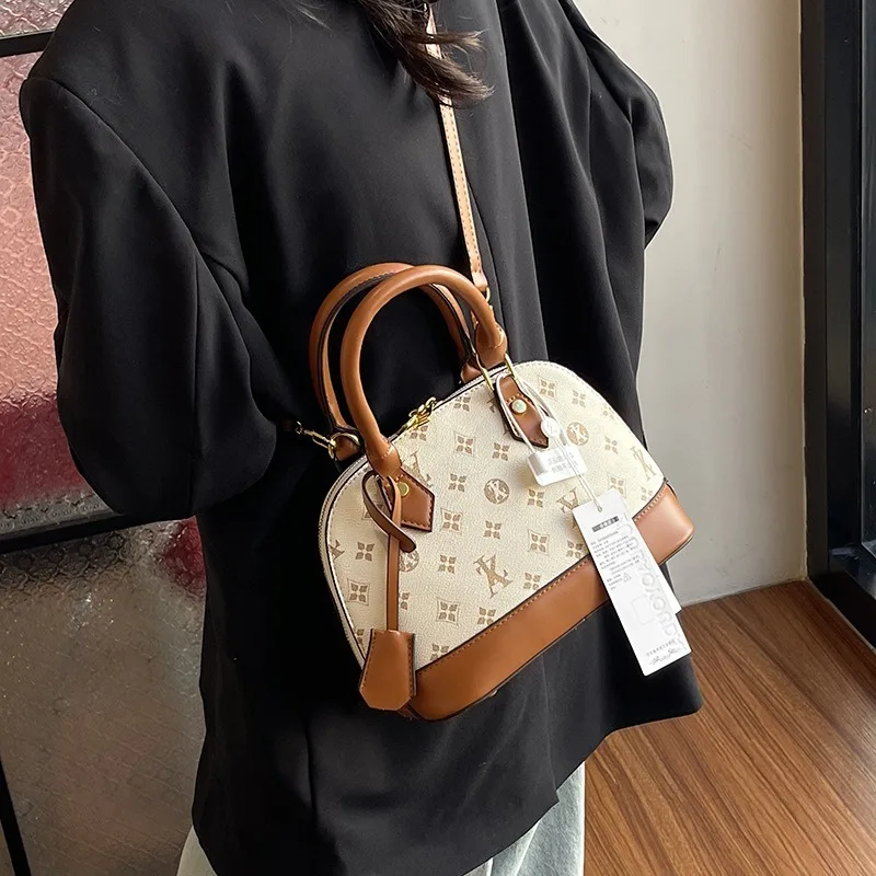 New shell bag handbag new niche temperament This year's popular explosion shoulder bag high-grade messenger bag.