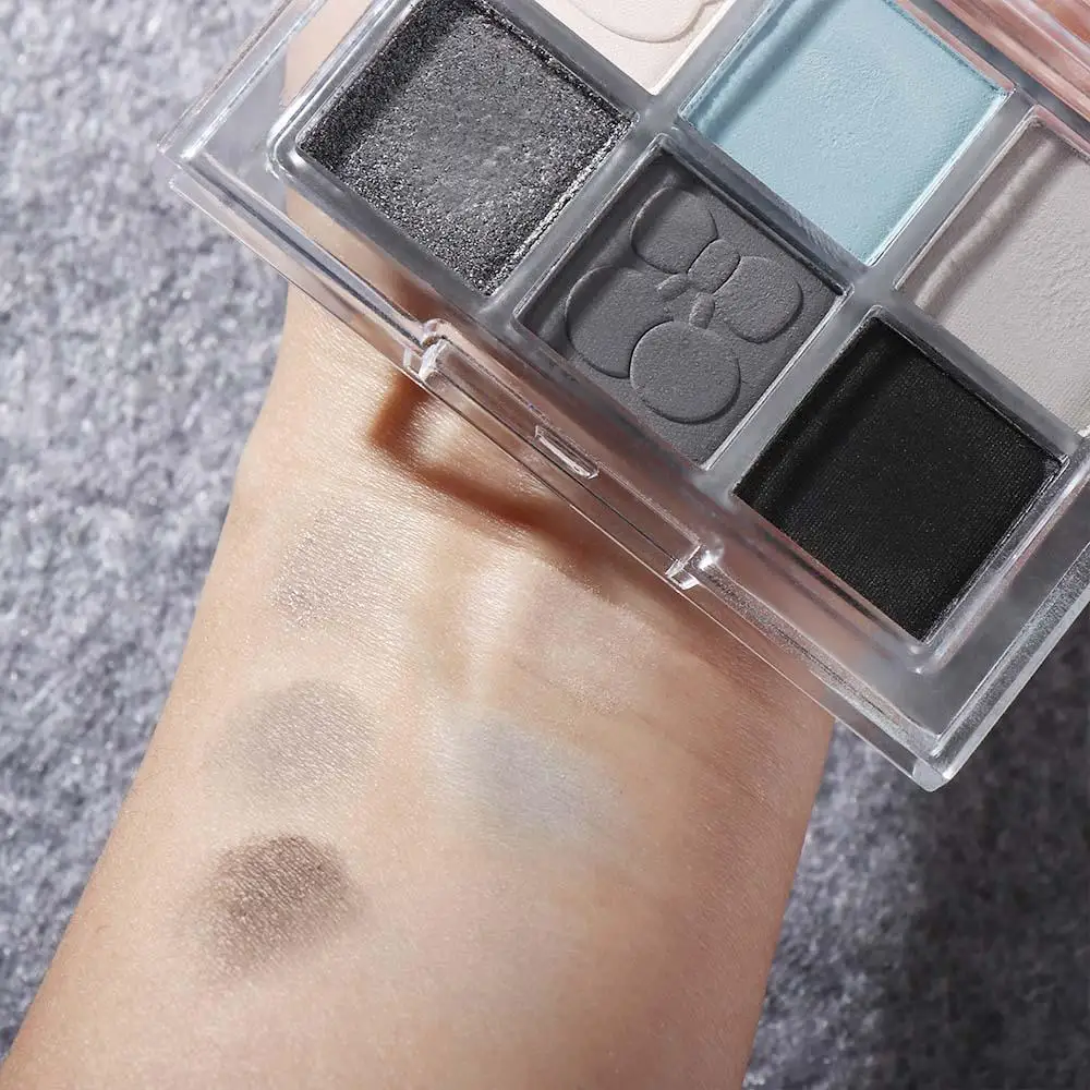 Palette di ombretti impermeabili a 6 colori Ombretto affumicato nero blu a lunga durata Evidenziatore Illumina i pigmenti degli occhi Cosmetici