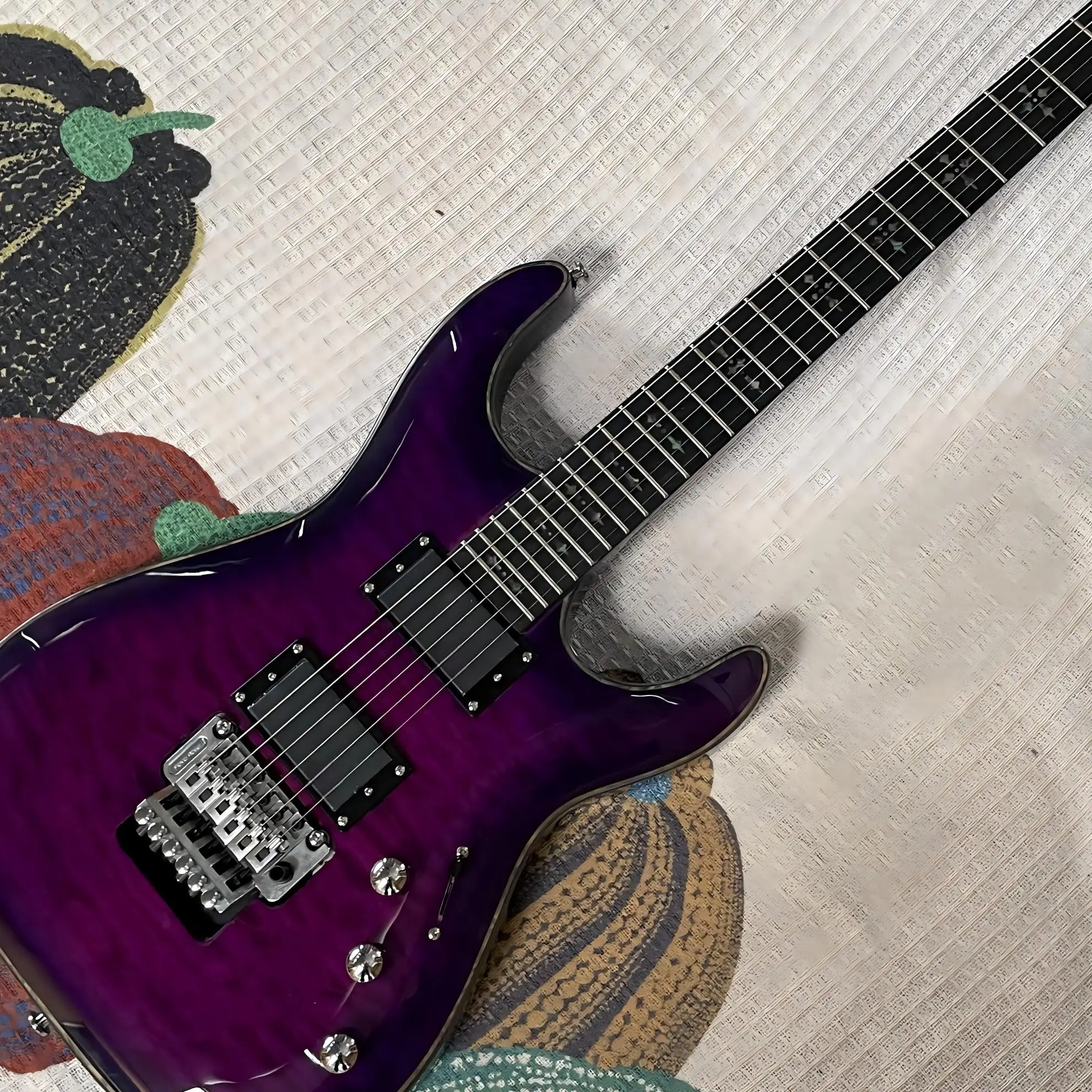 Trans Purple Quilt Maple Electric Guitar, HH Pickups, Double Locking Tremolo, Star Inlays, Chrome Hardware, 24 Frets