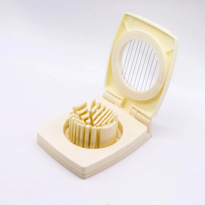 1A white two-in-one egg slicer，Simple Dual-Purpose Egg Slicer，Cheese and fruit cutting household kitchen gadget
