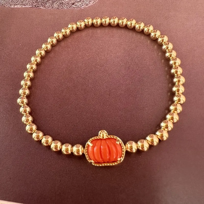 Europe and the United States fashion atmosphere sense of Halloween orange pumpkin copper ball stretch bracelet female jewelry