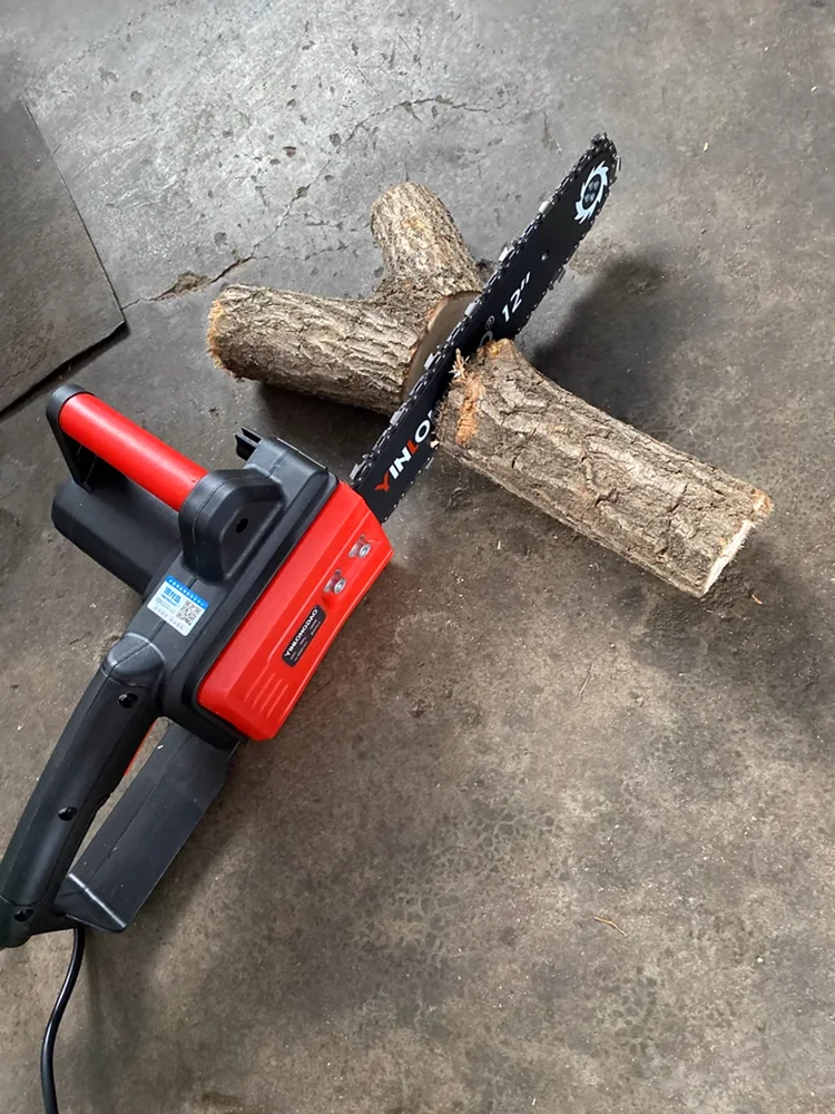 Plug-in electric chainsaw household sawing firewood small handheld electric felling saw 220v cutting wood electric chain saw
