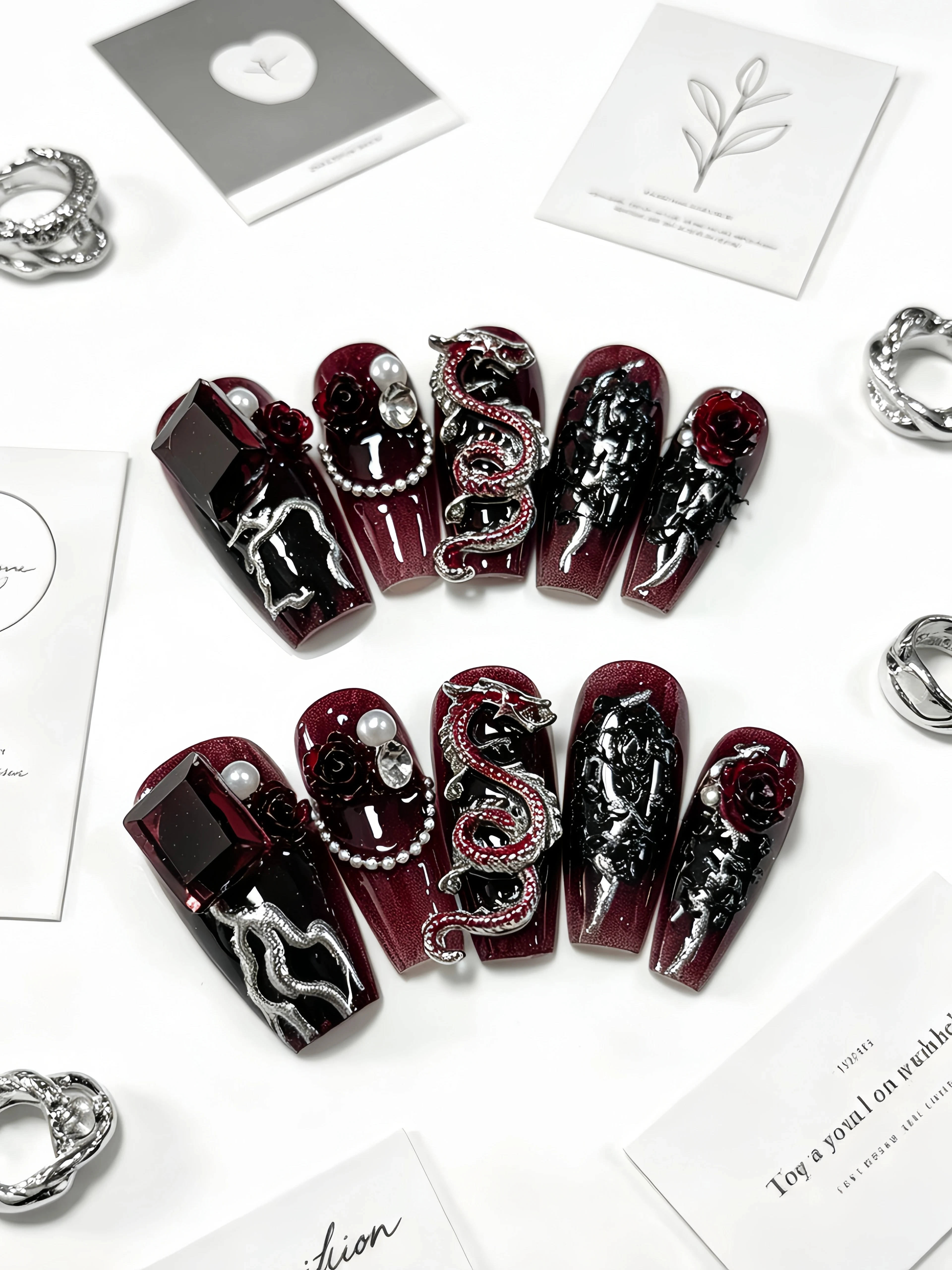 10 Medium-Sized Trapezoidal Press-On Nails, Black and Red Gradient Cat-Eye Nail Art, with Rhinestone Dragon Pattern, Silver Embellishments, Camellia Silver Pattern, Pearl Chain Embellishments, Nail Stickers, Dark Gothic Style for Daily Wear, Study, Workplace, Office, Bar, Clubbing, for Mature and Trendy Women, Sweet and Cool Outfits, Fake Nails for Dating, Photoshoots, Parties, Campus Life, Gothic Style Fake Nails, Includes a Jelly Glue and a Nail File