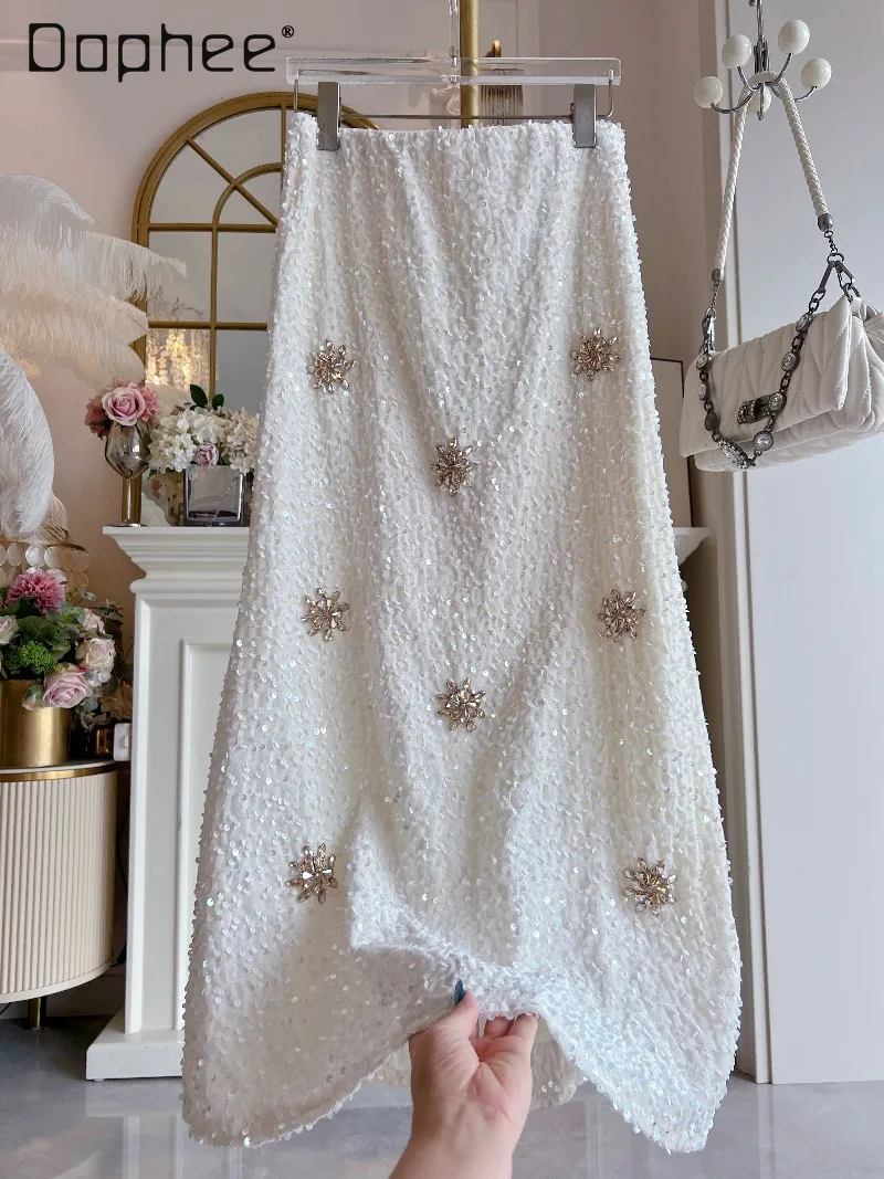 

Милая темпераментная светская юбка со стразами и бисером, женская осенне-зимняя утягивающая юбка трапециевидной формы средней длины с высокой талией и блестками