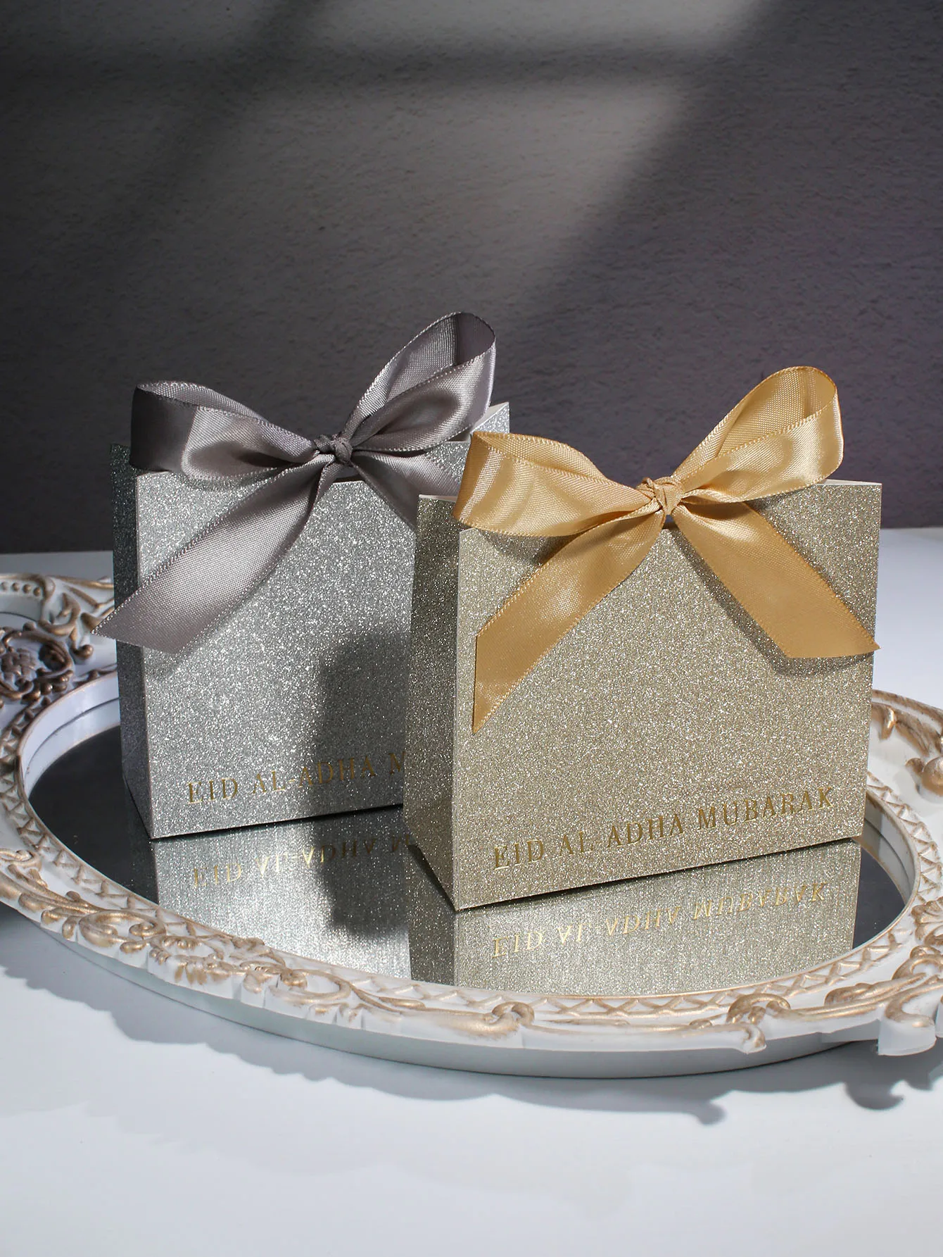 10 Stück exquisite Geschenkbox aus Silber und Gold, verziert mit Schleifen, feiert den schönen Moment von Eid al Adha zusammen