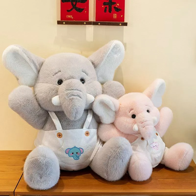 23 ซม.กระเป๋าเป้สะพายหลังสไตล์ใหม่ช้างตุ๊กตาของเล่นขนาดเล็กตกแต่งตุ๊กตาช้างสัตว์วันเกิดและคริสต์มาสของขวัญเด็ก