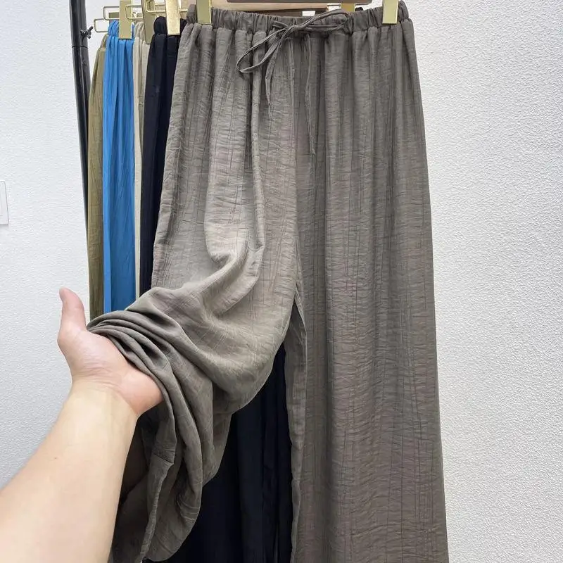 

Очень большой размер Ice Silk Thin Hanging Sensation Высокая талия Повседневные длинные брюки Женские большие размеры Свободные морщины Широкие брюки Su...