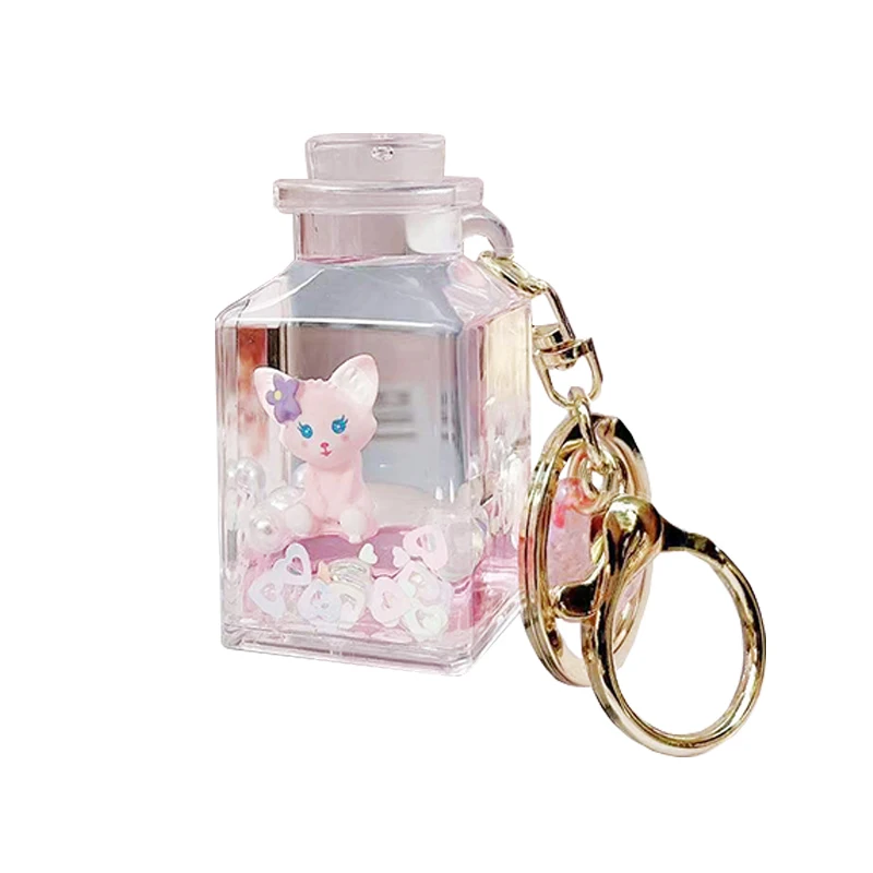 سلسلة مفاتيح كرتونية إبداعية ولطيفة لشخصية لينا بيل، تطفو في سائل زيت ورمل، زينة معلقة، هدية عيد ميلاد، مصنوعة من مادة الأكري...