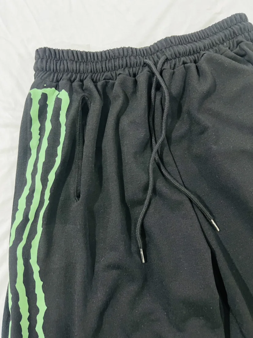 2025 ヨーロッパ系アメリカ人の足の形のヒップホップストリートラップ蛍光楽しいカジュアルルーズパンツ