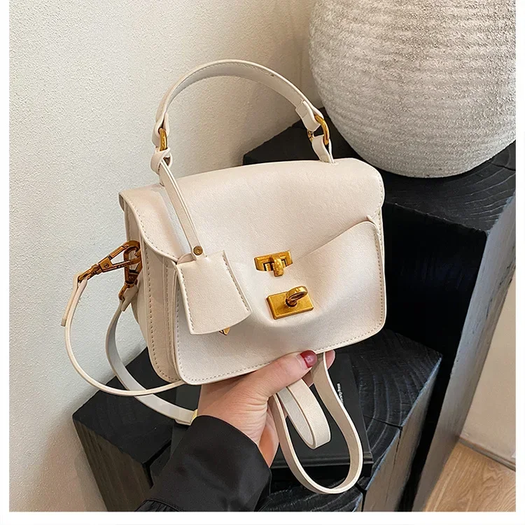 

2025 Spring New! Women's Retro Commuter Shoulder Bag Large Capacity Tote with High-End Turnlock Closure | Vintage Leather Design