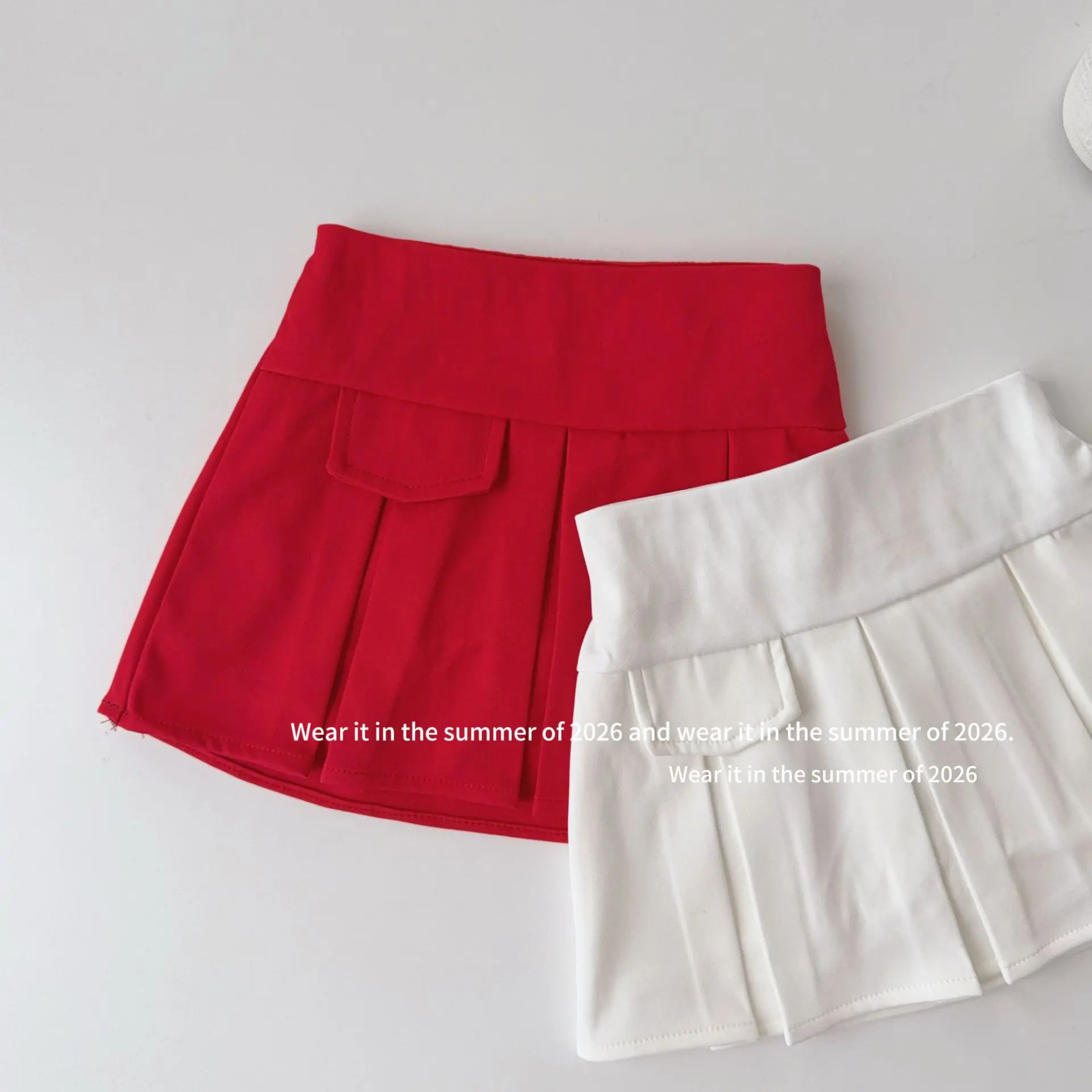 baby girls clothing new Solid color pleated A-line pleated skirt temperament 2026 girls summer short skirt
