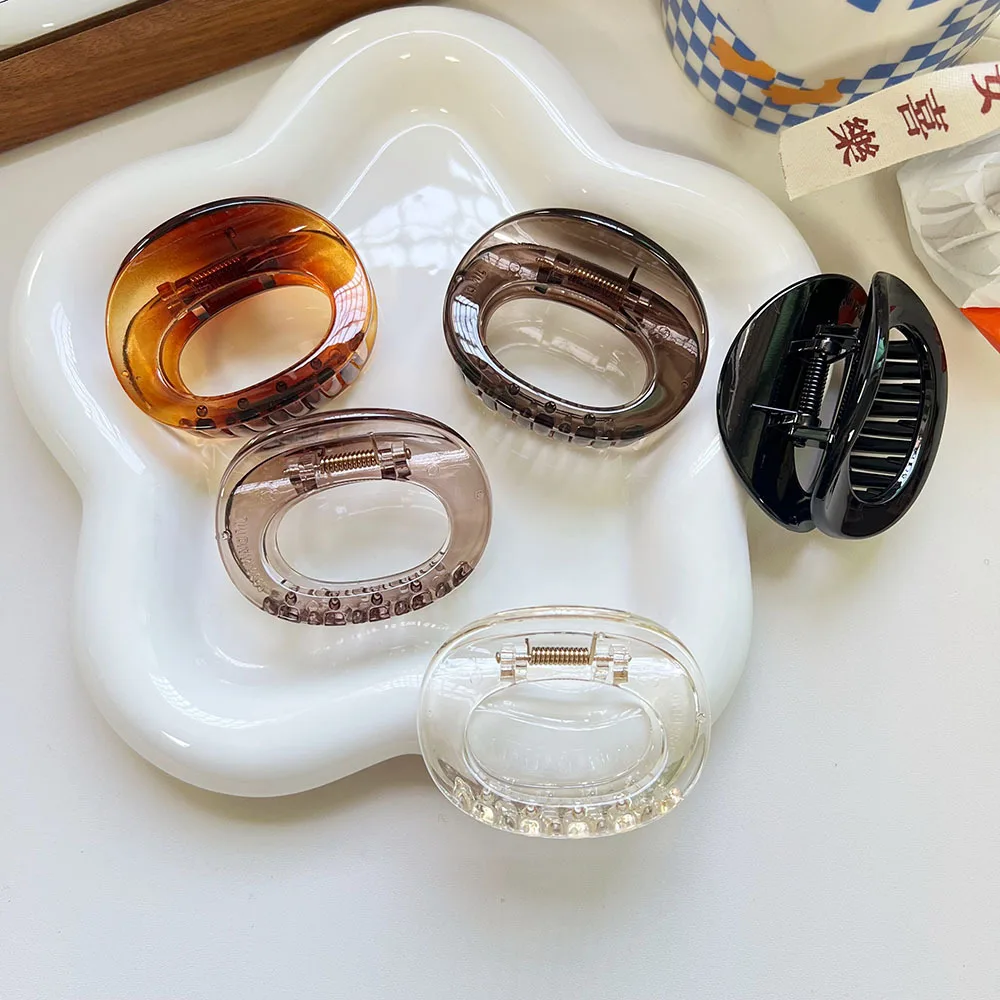 

Round Medium Hair Claw Clips Crab Barrettes Women Girls 6CM Ellipse Hollow Hair Clamps Shark Clips Ponytail Hair Accessories PC