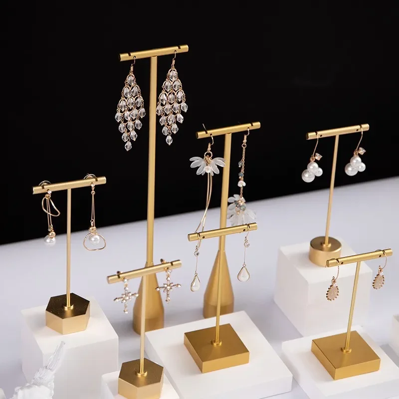 The creative metal earring and ring stands showcase earrings and rings brilliantly pushing display standards to a new level.