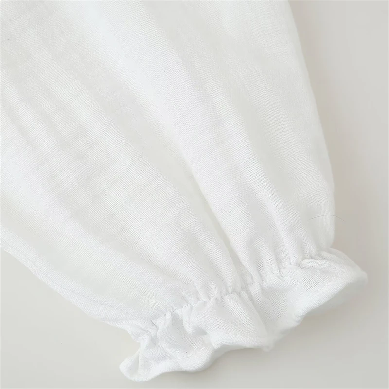 KEYANKETIAN Spring/Autumn New Holiday wind Embroidery Decoration White Shirt V-Neck Single Breasted Women's Long Sleeve Blouses