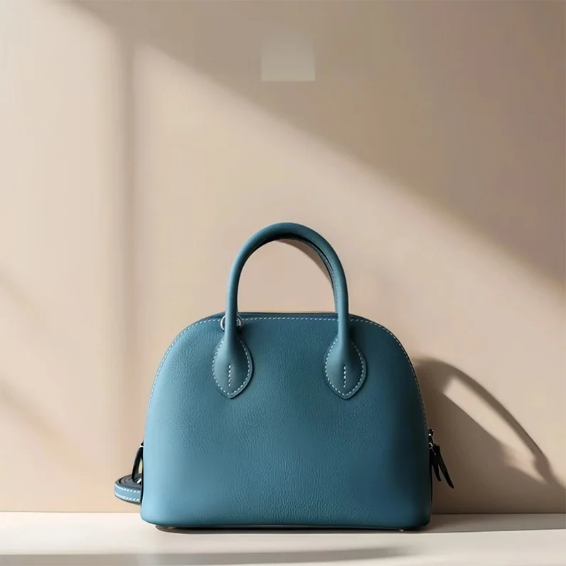 

2025 New Sle Women's Handbag ell ape Top Layer Cowhide Leather Soft Briti Sle Bowling Bag Crossbody Purse oulder Bag