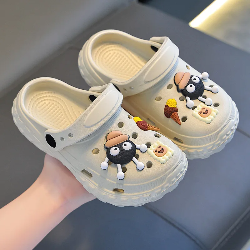 

Cave anti-skid stepping on shit feeling parent-child baotou breathable outside wearing children's beach cool slippers