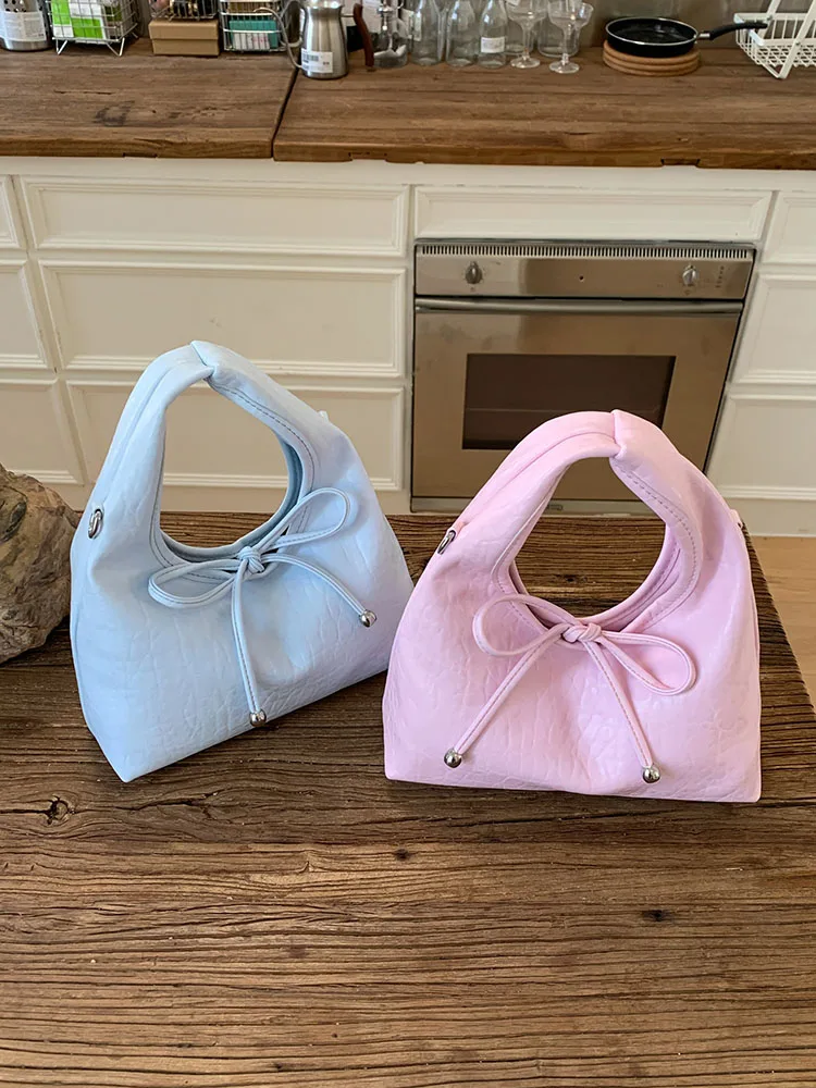 

Стильные женские сумки из мягкой кожи с бантом, весна-лето 2026, новые однотонные сумки через плечо в корейском стиле, милые повседневные кроссбоди