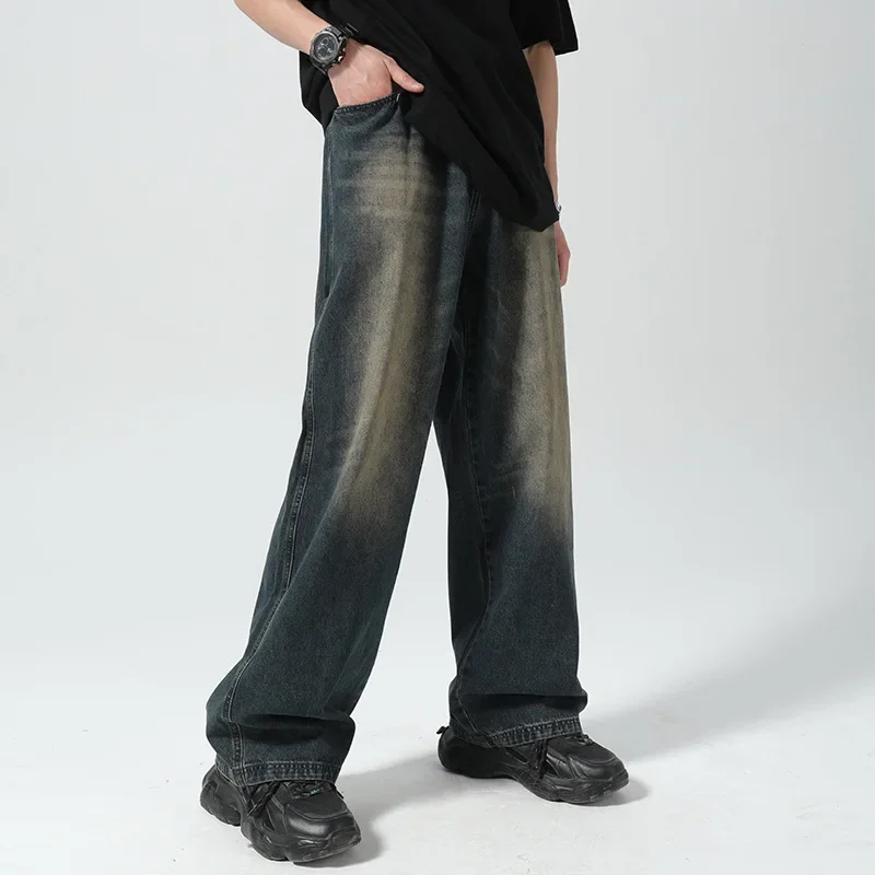 جينز رجالي للخريف موديل 2025 مغسول عتيق بجيوب يطير وسحّاب جينز واسع الساق فضفاض مناسب للانتظار بطول كامل