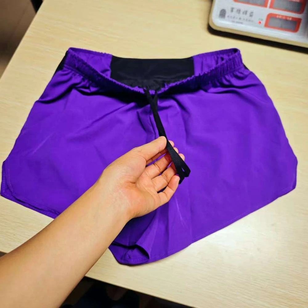 2026Seaside beach training quick-drying sports men's and women's marathon breathable running shorts with lined fanny packYYS02